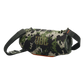 JBL Xtreme 4 portable Bluetooth speaker in camouflage design, open box, showing rugged exterior and control buttons.