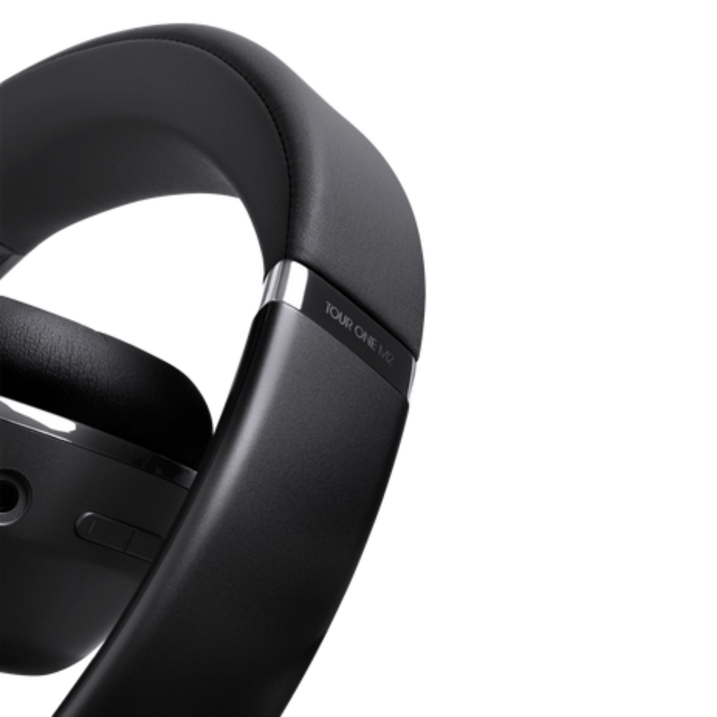 JBL Tour One M2 over-ear headphones with cushioned ear cups and sleek black design, showcasing premium audio quality.
