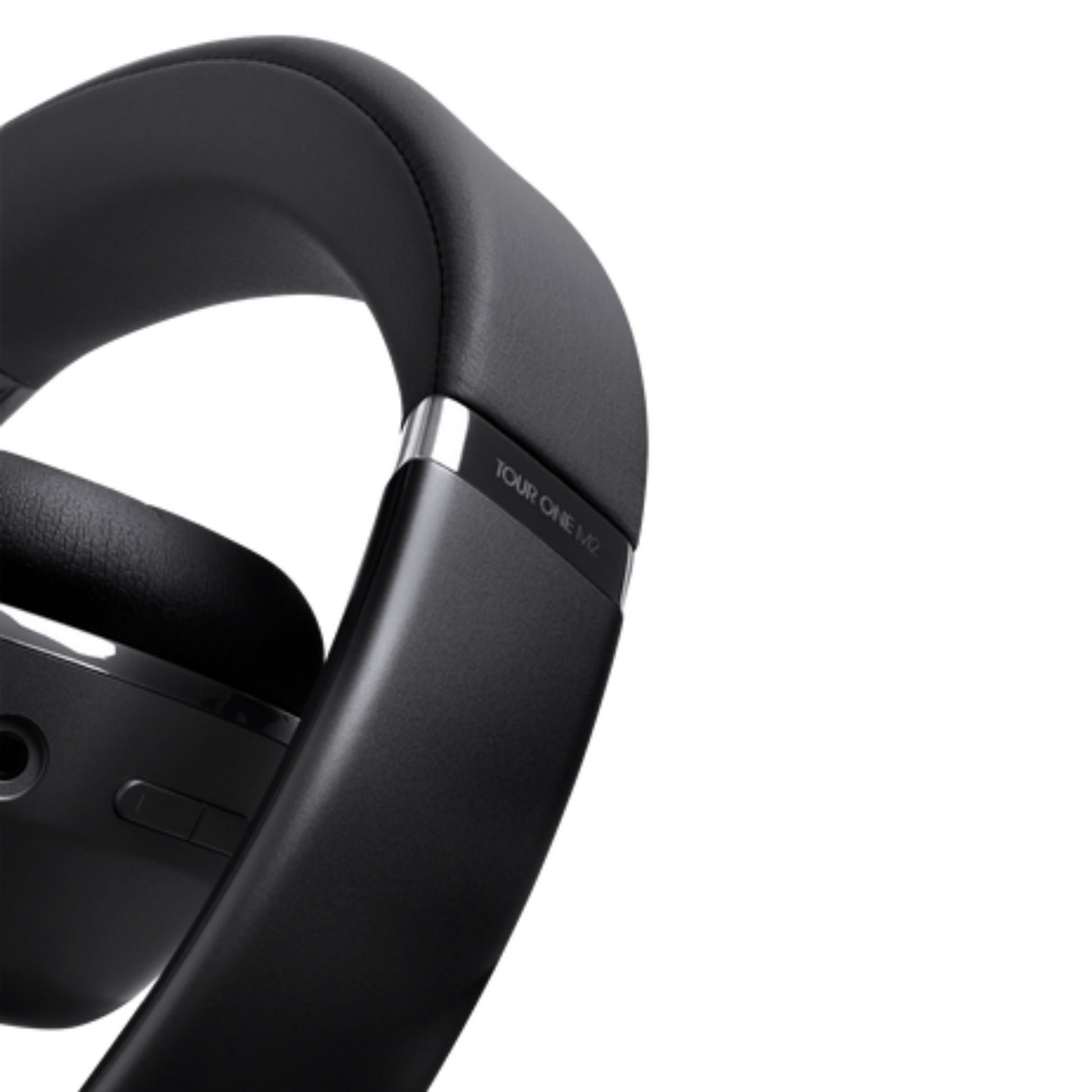 JBL Tour One M2 over-ear headphones with cushioned ear cups and sleek black design, showcasing premium audio quality.