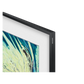 Open box Samsung The Frame 43-inch 4K UHD HDR QLED Tizen Smart TV with sleek design and mounted on a wall.