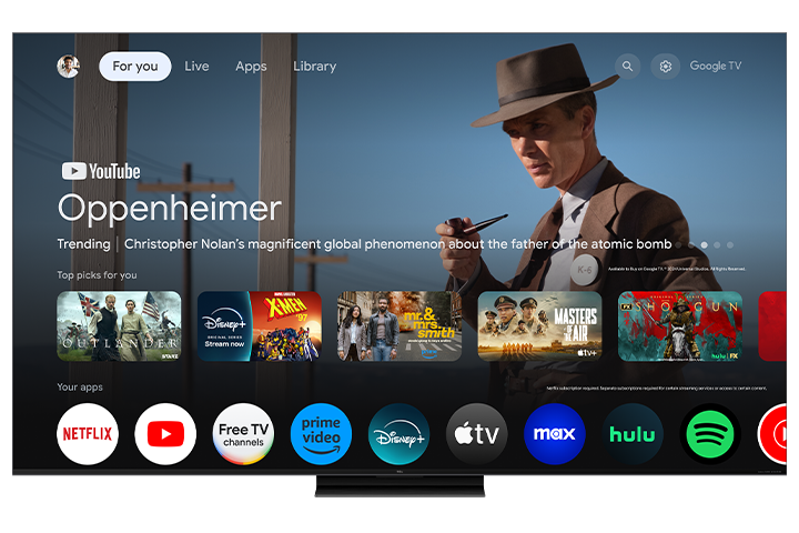 Open box TCL 85-inch QM7K Series 4K UHD HDR QD-Mini LED Smart Google TV displaying a sleek TV screen with vibrant images.