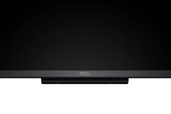 Open box TCL 85-inch QM6K Series 4K UHD HDR QD-Mini LED Smart Google TV displaying a vibrant home screen.