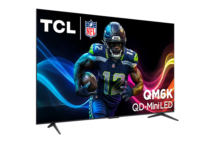 Open box TCL 85-inch QM6K Series 4K UHD HDR QD-mini LED Smart Google TV showing screen and sleek black frame.