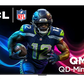 Open box TCL 85-inch QM6K Series 4K UHD HDR QD-Mini LED Smart Google TV displaying a vibrant home screen.